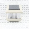 LMT 5558NA Galaxy Solar LED Lighted Vinyl Post Cap - Almond (Grid Shown For Scale)
